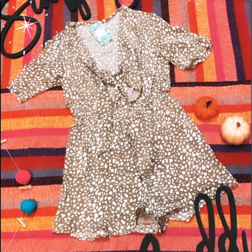 Spotted tie romper.